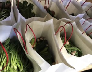 bags with vegetables. food donations for The Pantry by Feeding Hawaii Together